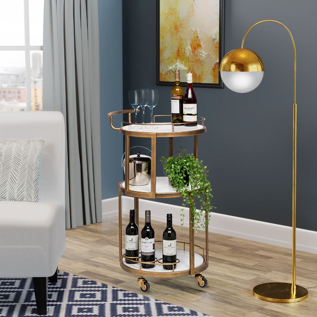 Round White Marble Bistro Drinks Trolley in French Brass in Room